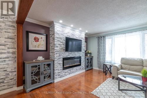 7730 Sixth Line, Centre Wellington, ON - Indoor Photo Showing Living Room With Fireplace