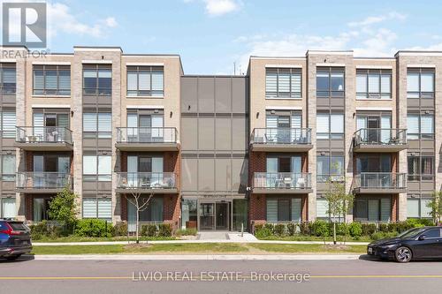 206 - 95 Attmar Drive, Brampton, ON - Outdoor With Balcony With Facade