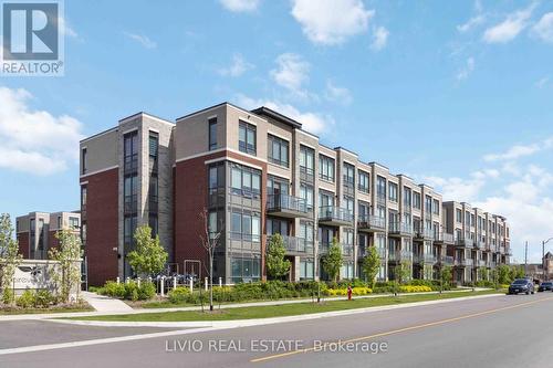 206 - 95 Attmar Drive, Brampton, ON - Outdoor With Balcony With Facade