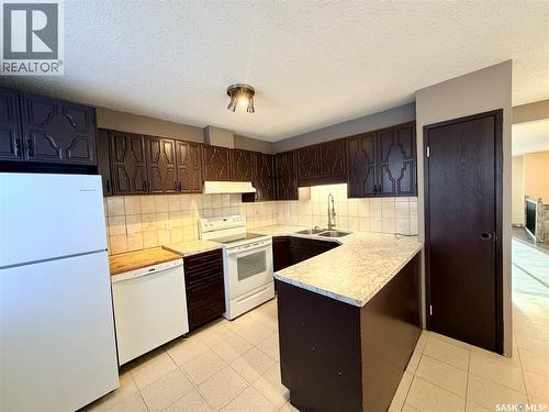 20 4Th Avenue E, Neilburg, SK - Indoor Photo Showing Kitchen With Double Sink