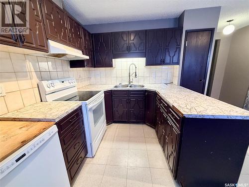 20 4Th Avenue E, Neilburg, SK - Indoor Photo Showing Kitchen With Double Sink