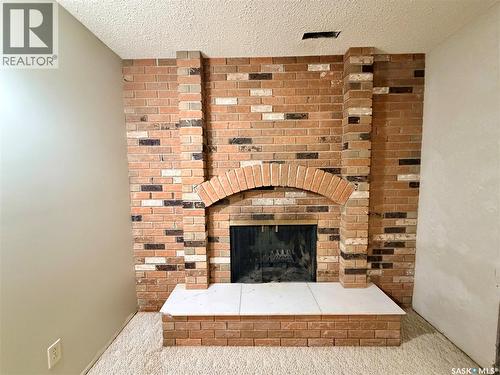 20 4Th Avenue E, Neilburg, SK - Indoor Photo Showing Living Room With Fireplace