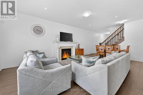 63 Chamomile Drive, Hamilton, ON - Indoor Photo Showing Living Room With Fireplace