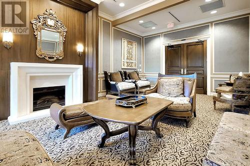 511 - 9235 Jane Street, Vaughan, ON - Indoor Photo Showing Other Room With Fireplace