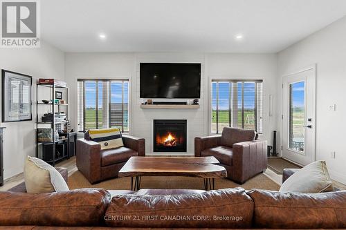 672 Ketter Way, Plympton-Wyoming (Plympton Wyoming), ON - Indoor Photo Showing Living Room With Fireplace