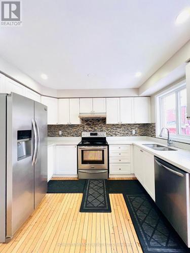 16 Marshmarigold Drive, Brampton, ON - Indoor Photo Showing Kitchen With Stainless Steel Kitchen With Double Sink With Upgraded Kitchen