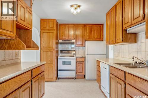 620 20Th Street W, Prince Albert, SK - Indoor Photo Showing Kitchen With Double Sink