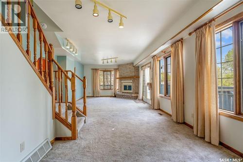 620 20Th Street W, Prince Albert, SK - Indoor Photo Showing Other Room With Fireplace