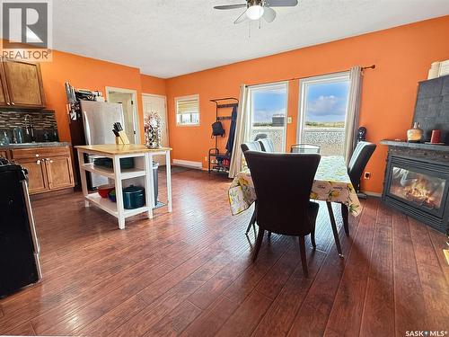 800 Railway Avenue, Webb, SK - Indoor Photo Showing Dining Room With Fireplace