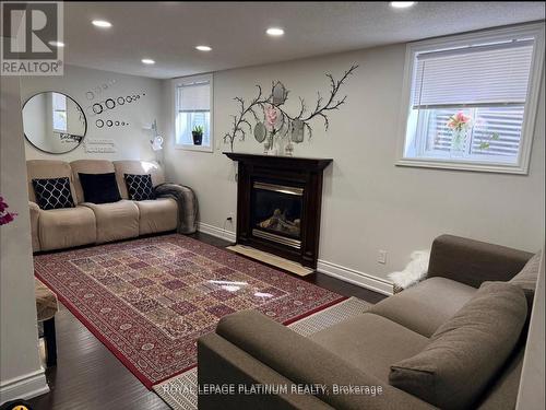 Legal Basement - 1540 Manorbrook Court, Mississauga, ON - Indoor Photo Showing Living Room With Fireplace