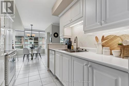 309 - 55 The Boardwalk Way, Markham, ON - Indoor Photo Showing Kitchen With Double Sink