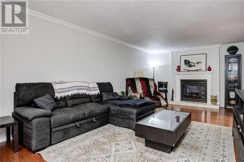 7 Riverbend Road, Wanup, ON - Indoor Photo Showing Living Room With Fireplace