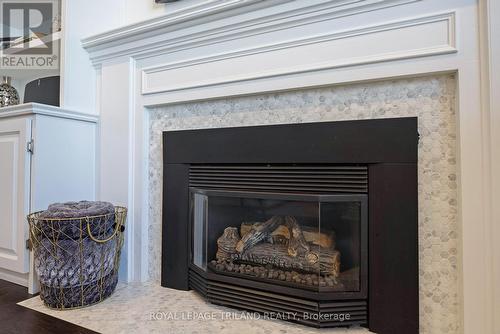 73 Mcleod Crescent, London North (North H), ON - Indoor Photo Showing Living Room With Fireplace
