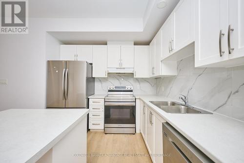 23 Perenack Avenue, Welland (Broadway), ON - Indoor Photo Showing Kitchen With Double Sink