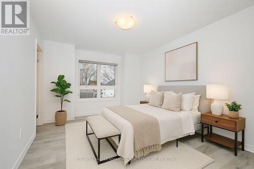 Virtually staged - 23 Perenack Avenue, Welland (Broadway), ON - Indoor Photo Showing Bedroom