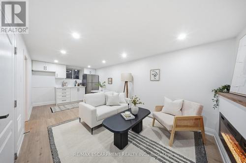 11 Garside Avenue S, Hamilton, ON - Indoor With Fireplace