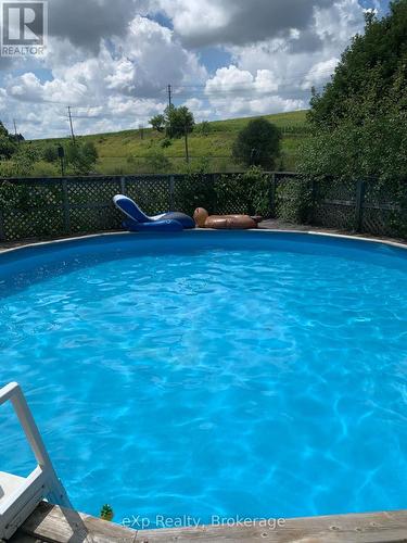 7922 Hwy 7 Highway, Guelph/Eramosa, ON - Outdoor With Above Ground Pool