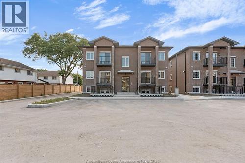 233 Watson Unit# 306, Windsor, ON - Outdoor With Facade