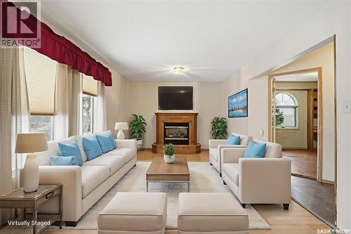 330 Fehr Crescent, Martensville, SK - Indoor Photo Showing Living Room With Fireplace