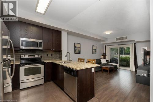 570 Lolita Gardens Unit# 125, Mississauga, ON - Indoor Photo Showing Kitchen With Stainless Steel Kitchen With Double Sink With Upgraded Kitchen