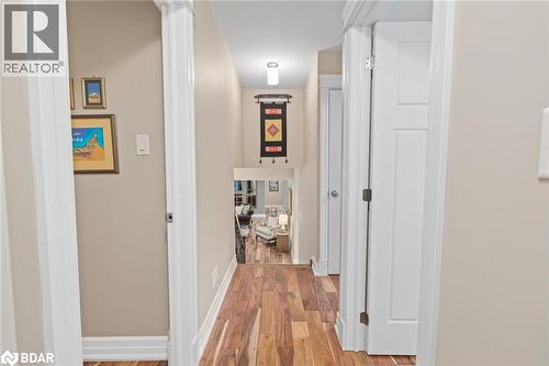 Hall featuring light wood-type flooring and baseboards - 13609 Sixth Line, Limehouse, ON - Indoor Photo Showing Other Room