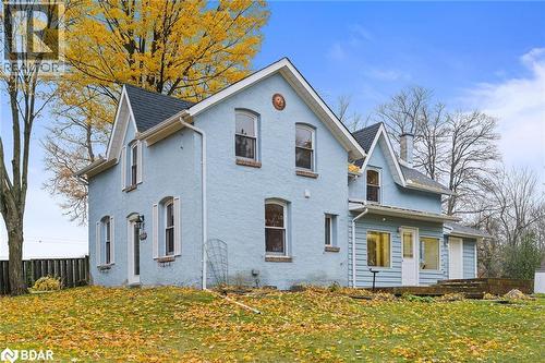 View of property exterior featuring stucco siding, a chimney, and roof with shingles - 9328 Wellington Road 50, Erin, ON - Outdoor
