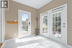 Doorway with tile patterned flooring - 