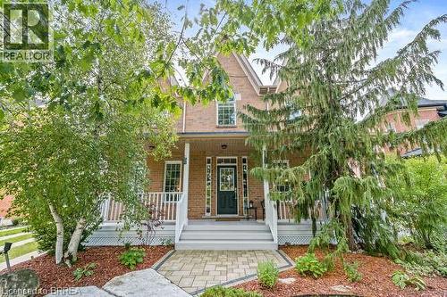 View of front of home with a porch and brick siding - 119 Parkview Lane, Rockwood, ON - Outdoor With Deck Patio Veranda