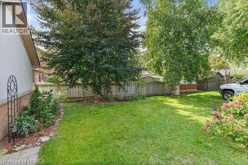View of fenced backyard - 119 Parkview Lane, Rockwood, ON - Outdoor