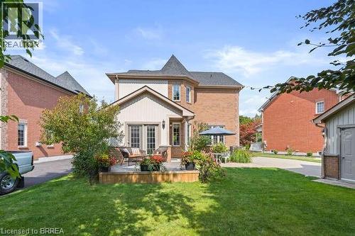 Back of property with a yard and a wooden deck - 119 Parkview Lane, Rockwood, ON - Outdoor