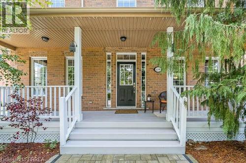 Property entrance with brick siding - 119 Parkview Lane, Rockwood, ON - Outdoor With Deck Patio Veranda With Exterior