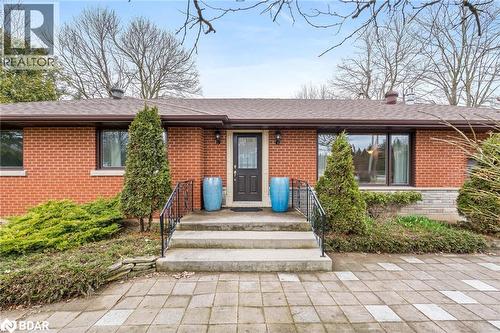 Single story home with brick siding and roof with shingles - 11317 Regional Road 25, Halton Hills, ON - Outdoor