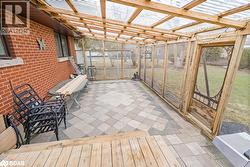 Sunroom / solarium featuring a patio - 