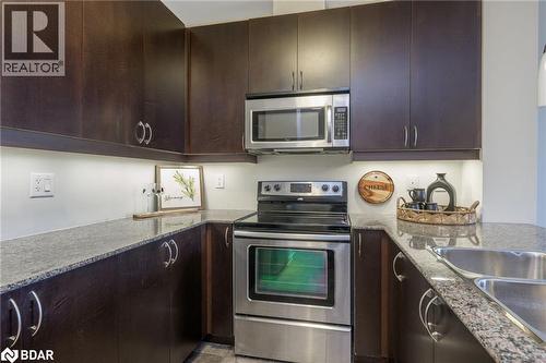 383 E Main Street Unit# 308, Milton, ON - Indoor Photo Showing Kitchen With Stainless Steel Kitchen With Double Sink
