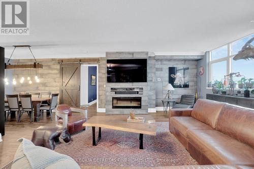 1616 - 9225 Jane Street, Vaughan, ON - Indoor Photo Showing Living Room With Fireplace