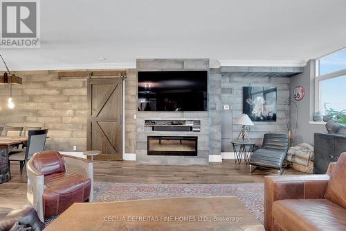 1616 - 9225 Jane Street, Vaughan, ON - Indoor Photo Showing Living Room With Fireplace