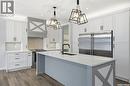 559 Bolstad Turn, Saskatoon, SK  - Indoor Photo Showing Kitchen With Double Sink With Upgraded Kitchen 