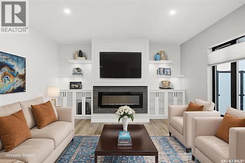559 Bolstad Turn, Saskatoon, SK - Indoor Photo Showing Living Room With Fireplace