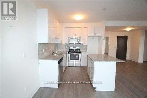 411 - 2900 Highway 7 Road, Vaughan, ON - Indoor Photo Showing Kitchen With Upgraded Kitchen