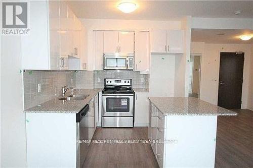411 - 2900 Highway 7 Road, Vaughan, ON - Indoor Photo Showing Kitchen With Upgraded Kitchen
