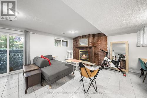 Bsmnt - 51 Watson Street, Toronto, ON - Indoor With Fireplace