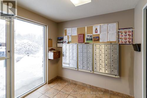 Mail Boxes in Clubhouse - 58 - 275 Huron Street, Clearview (Stayner), ON - Indoor Photo Showing Other Room