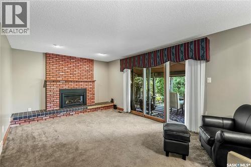 10 Selkirk Crescent, Regina, SK - Indoor Photo Showing Living Room With Fireplace