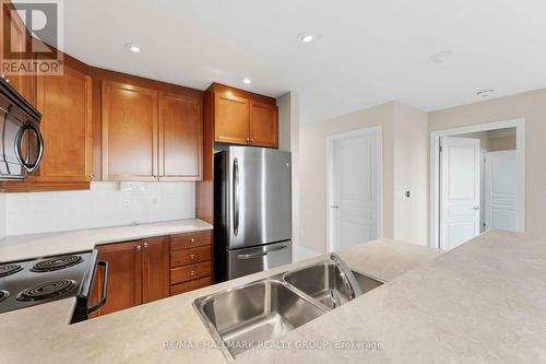 320 - 905 Beauparc Private, Ottawa, ON - Indoor Photo Showing Kitchen With Double Sink