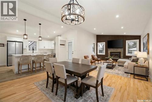 78 Sunset Drive, Regina, SK - Indoor Photo Showing Dining Room With Fireplace