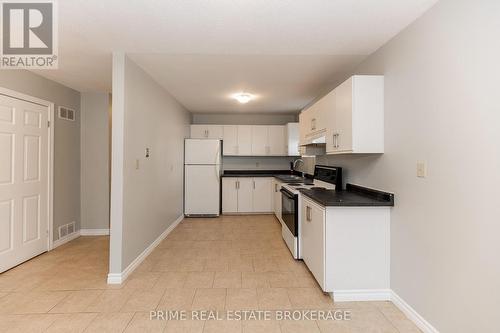 2 - 219 Emerson Avenue, London South (South H), ON - Indoor Photo Showing Kitchen With Double Sink