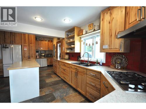 2650 Rose Drive, 150 Mile House, BC - Indoor Photo Showing Kitchen With Double Sink