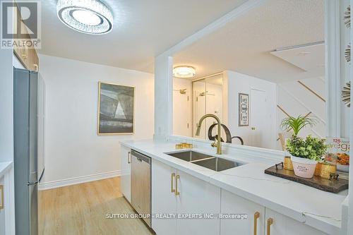 713 - 35 Trailwood Drive, Mississauga, ON - Indoor Photo Showing Kitchen With Double Sink
