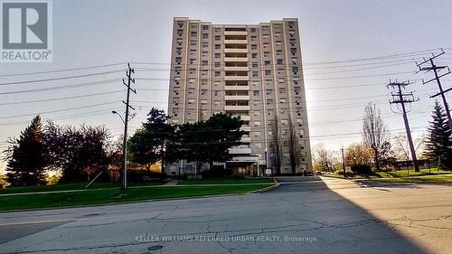 303 - 14 Neilson Drive, Toronto, ON - Outdoor With Balcony With Facade