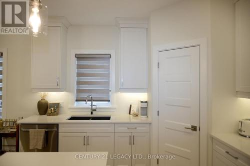 675 Winchester Avenue S, North Perth, ON - Indoor Photo Showing Kitchen With Double Sink